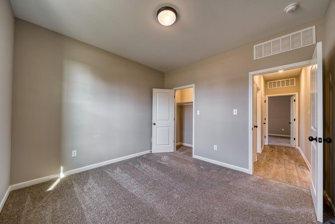 142 Como Lane Atoka, TN 38004 - Photo 24 of 33 an empty room with closet and a bathroom