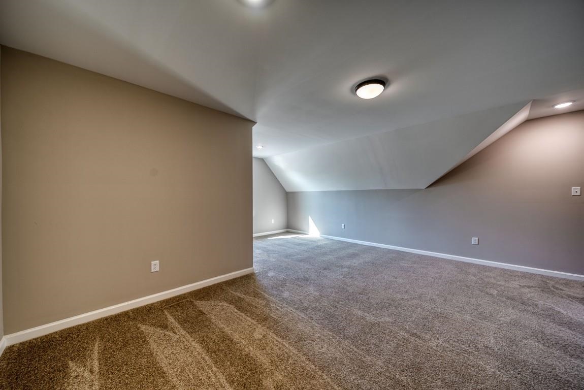 142 Como Lane Atoka, TN 38004 - Photo 28 of 33 Bonus room with vaulted ceiling, carpet, and recessed lighting