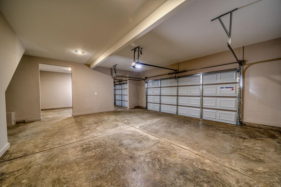 142 Como Lane Atoka, TN 38004 - Photo 30 of 33 Garage featuring baseboards