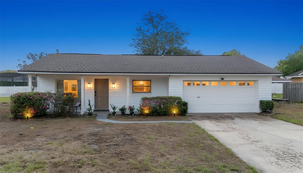 2733 Middle Street Orlando, FL 32807 - Photo 22 of 23 a front view of a house with a yard