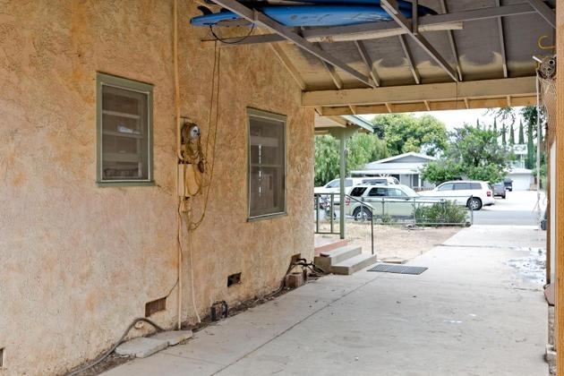 210 Sunset Avenue Oak View, CA 93022 - Photo 14 of 15 a patio with table and chairs and potted plants
