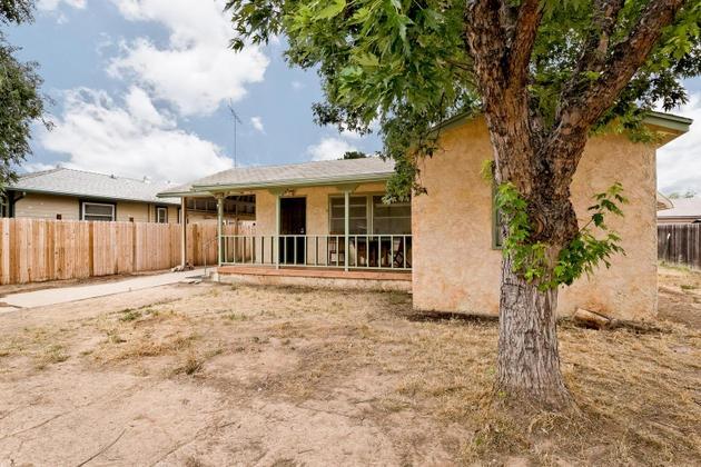 210 Sunset Avenue Oak View, CA 93022 - Photo 15 of 15 a house with trees in front of it