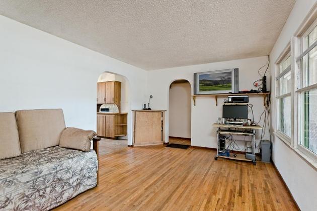 210 Sunset Avenue Oak View, CA 93022 - Photo 4 of 15 a bedroom with furniture and a wooden floor