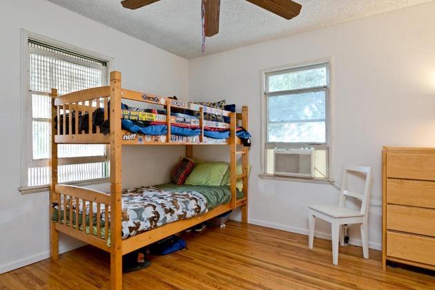 210 Sunset Avenue Oak View, CA 93022 - Photo 8 of 15 a bedroom with furniture and a window