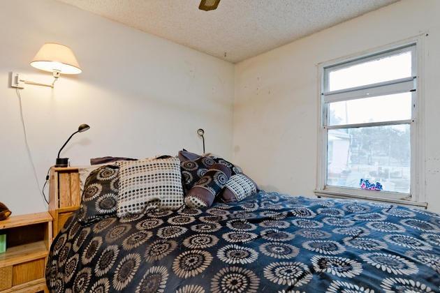 210 Sunset Avenue Oak View, CA 93022 - Photo 10 of 15 a bedroom with a bed and a window