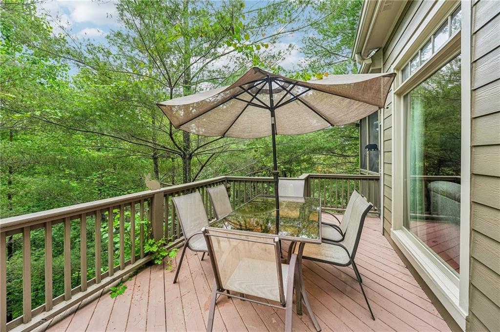 14 Laurel Ridge Lane Big Canoe, GA 30143 - Photo 63 of 72 a view of a balcony with furniture and wooden floor