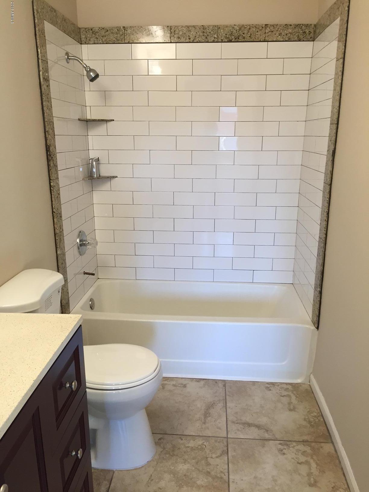 2523 East Chipman Road Phoenix, AZ 85040 - Photo 11 of 18 master bathroom shower