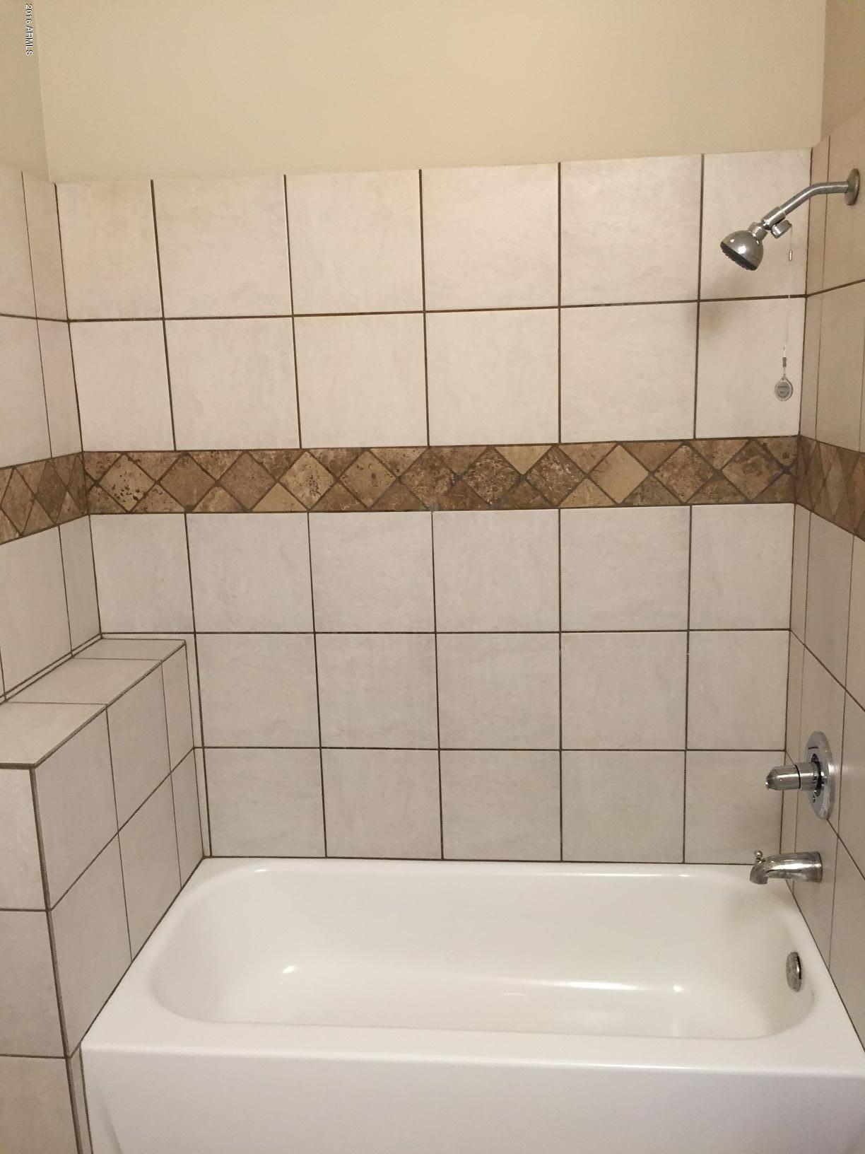 2523 East Chipman Road Phoenix, AZ 85040 - Photo 16 of 18 guest bathroom tub shower