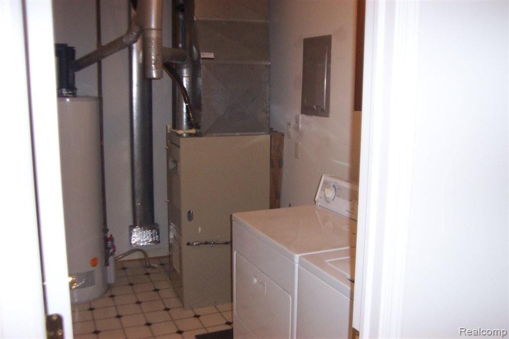 904 Ridge Court, Unit 123 Brighton, MI 48116 - Photo 20 of 23 laundry & mechanicals.jpg