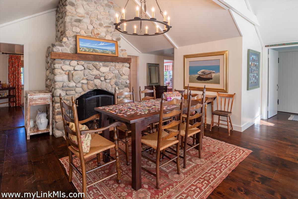 14 & 16 Coffin Street Nantucket, MA 02554 - Photo 7 of 50 a living room with furniture a fireplace and wooden floor