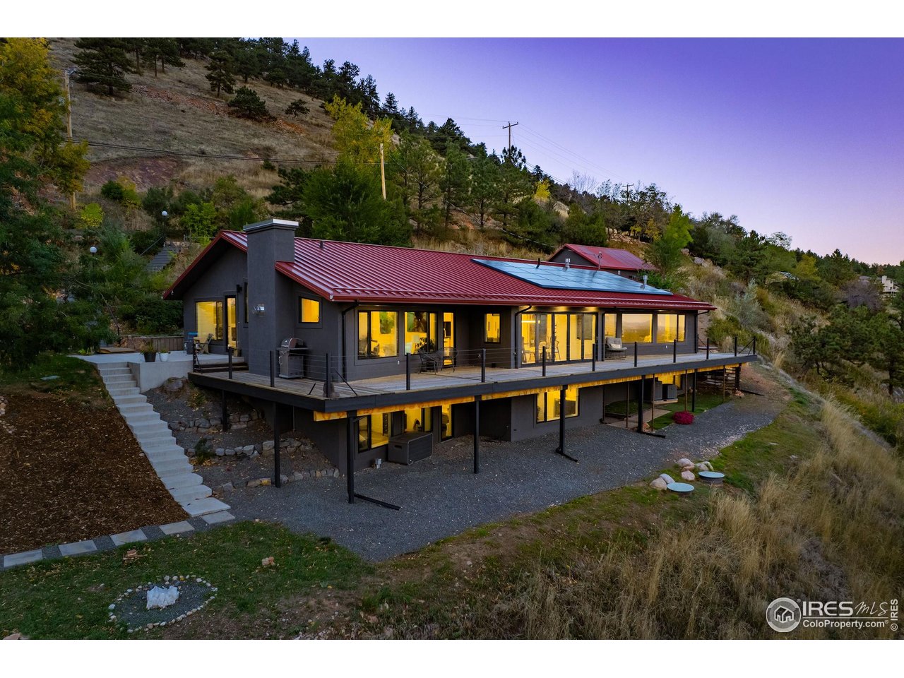 5880 Olde Stage Road Boulder, CO 80302 - Photo 1 of 50 a view of a yard with furniture and a yard