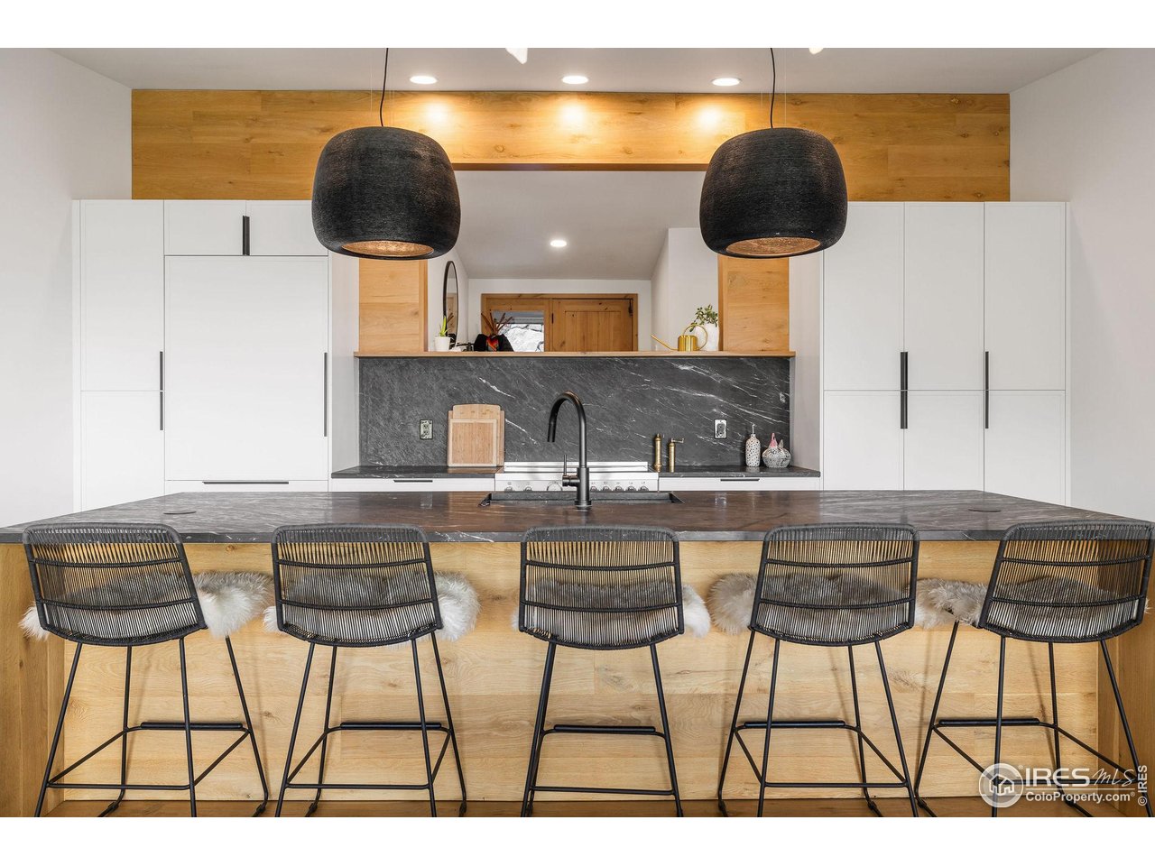 5880 Olde Stage Road Boulder, CO 80302 - Photo 18 of 50 a kitchen with a table and chairs