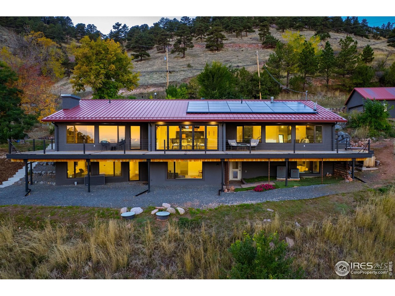 5880 Olde Stage Road Boulder, CO 80302 - Photo 4 of 50 a view of swimming pool with outdoor seating and city view