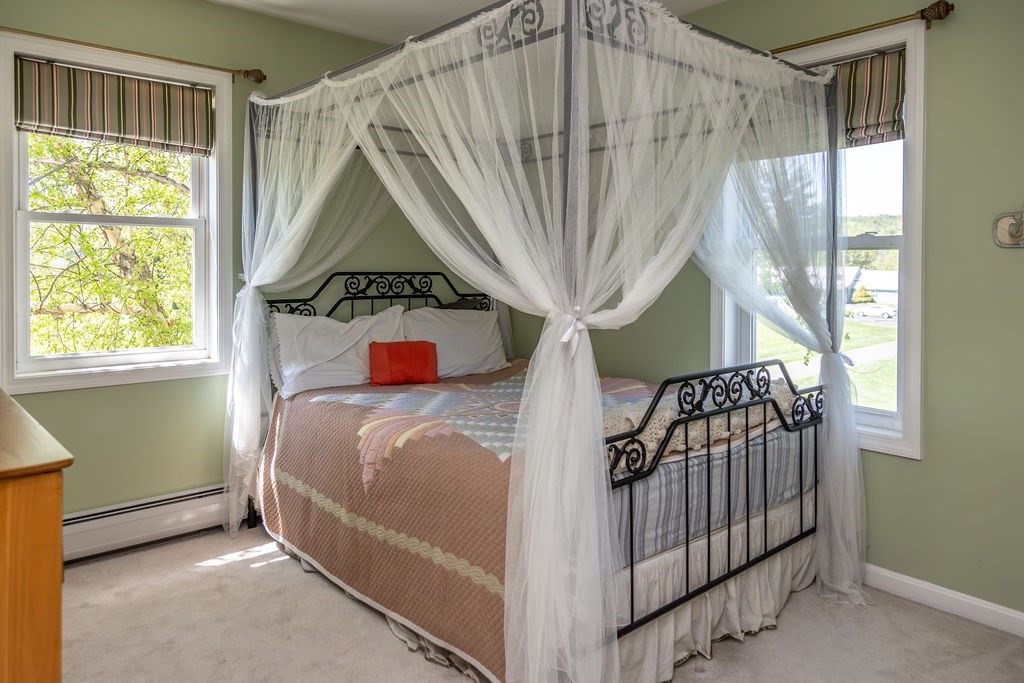 188 State Road Whately, MA 01373 - Photo 12 of 42 a bedroom with a bed and a window