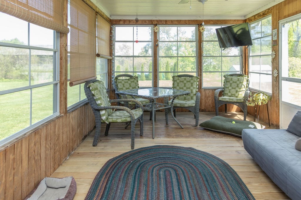 188 State Road Whately, MA 01373 - Photo 16 of 42 a living room with furniture and a large window