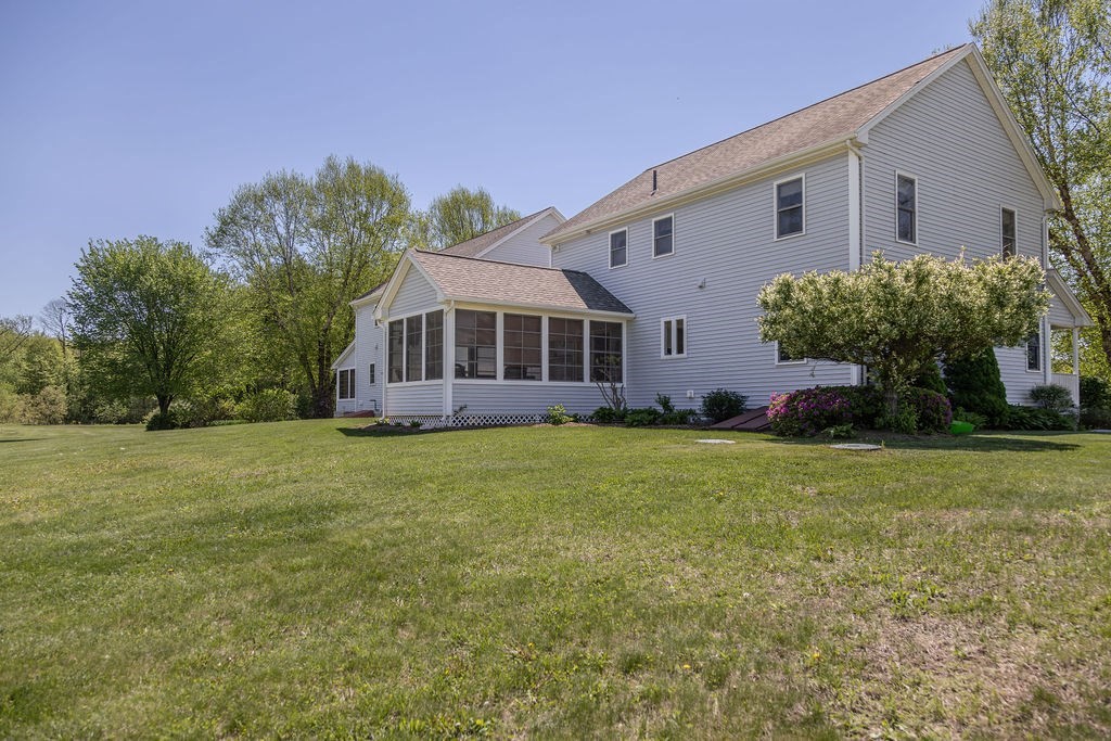 188 State Road Whately, MA 01373 - Photo 17 of 42 a front view of a house with garden
