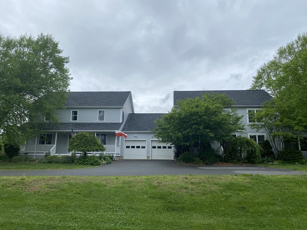 188 State Road Whately, MA 01373 - Photo 2 of 42 a front view of a house with a yard