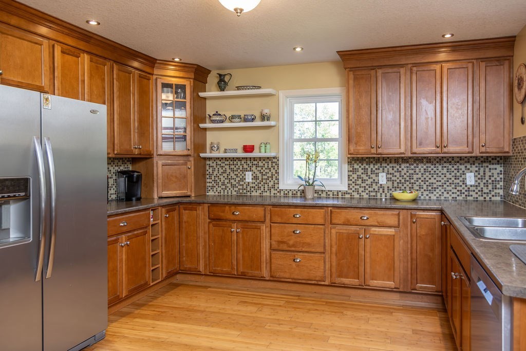 188 State Road Whately, MA 01373 - Photo 22 of 42 a kitchen with stainless steel appliances granite countertop a refrigerator and a sink