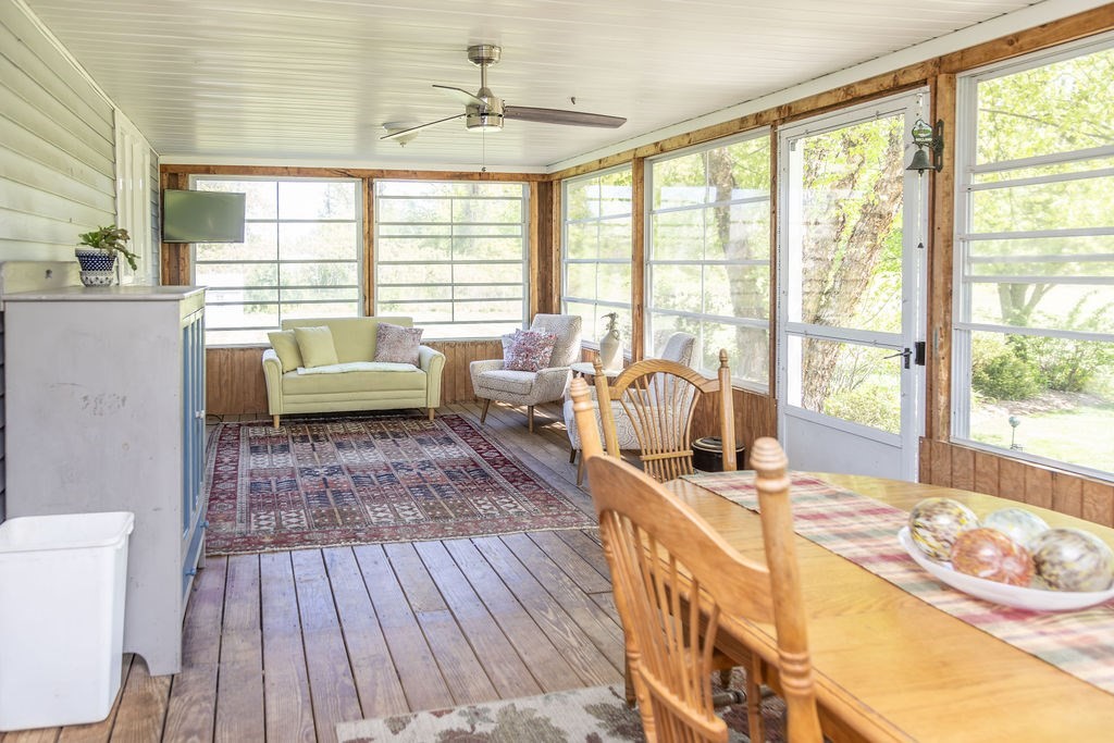 188 State Road Whately, MA 01373 - Photo 25 of 42 a living room with furniture and large windows