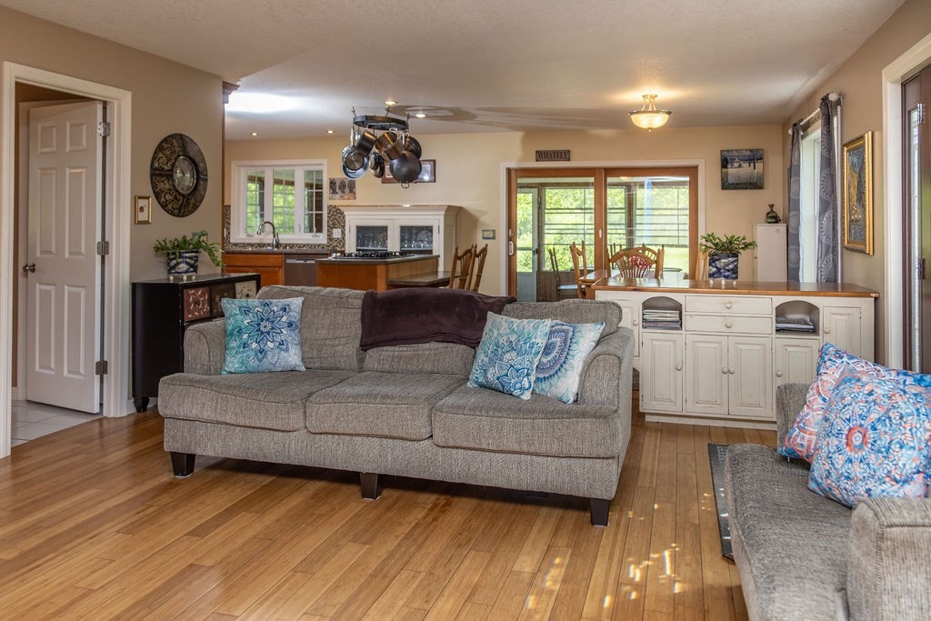 188 State Road Whately, MA 01373 - Photo 27 of 42 a living room with furniture and a large window