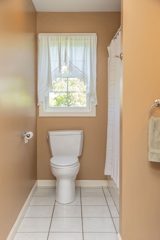188 State Road Whately, MA 01373 - Photo 28 of 42 a bathroom with a toilet a sink and a window