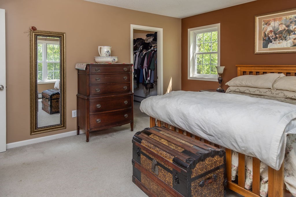 188 State Road Whately, MA 01373 - Photo 32 of 42 a bedroom with a bed and a closet