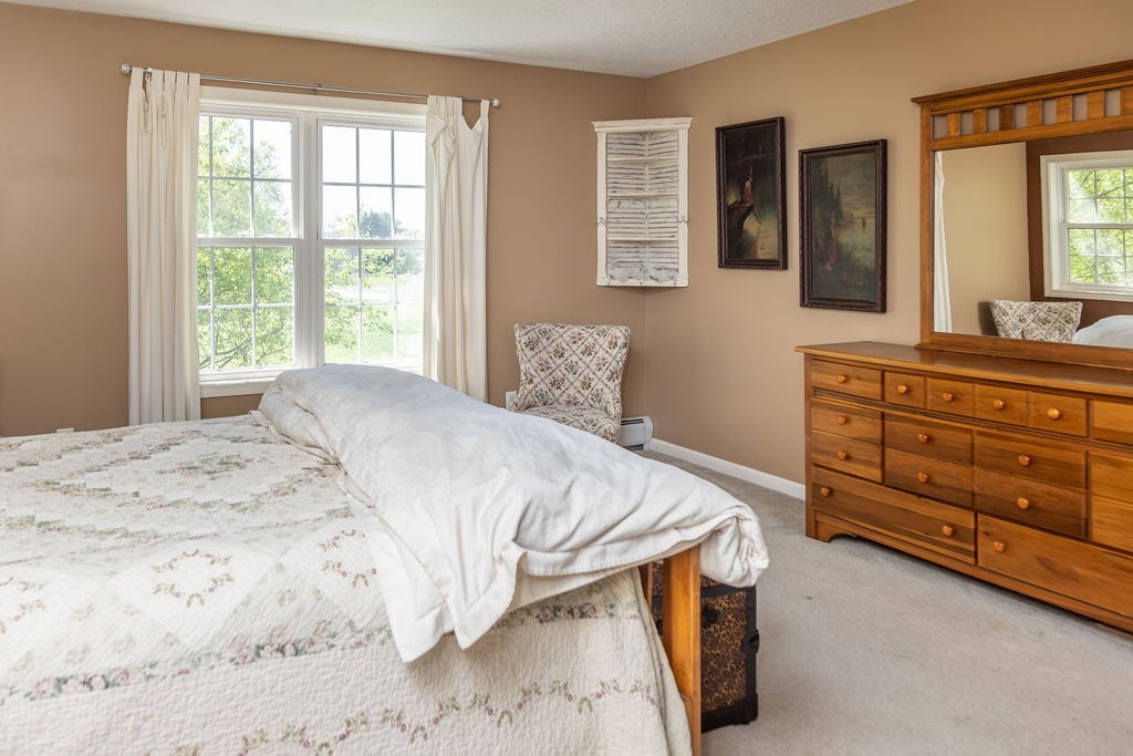 188 State Road Whately, MA 01373 - Photo 33 of 42 a bedroom with a bed and a dresser
