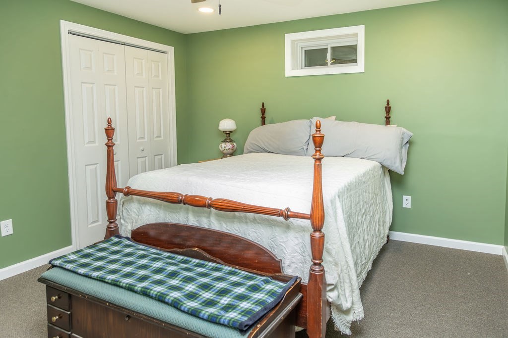 188 State Road Whately, MA 01373 - Photo 36 of 42 a bedroom with a bed and a window