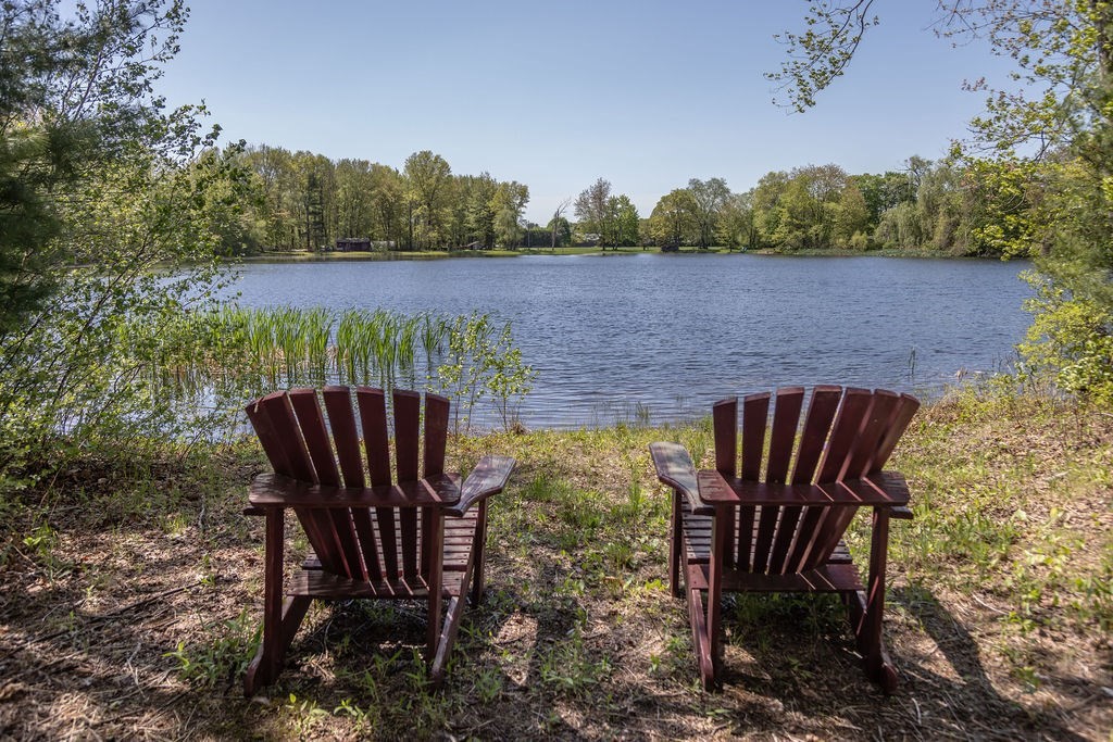 188 State Road Whately, MA 01373 - Photo 40 of 42 a view of a couches in the patio next to a yard