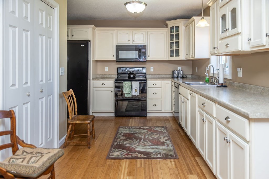 188 State Road Whately, MA 01373 - Photo 6 of 42 a kitchen with stainless steel appliances granite countertop a refrigerator sink and cabinets