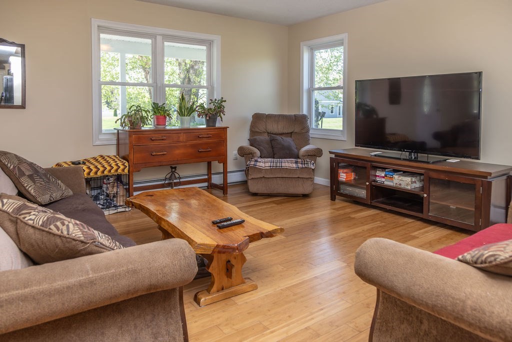 188 State Road Whately, MA 01373 - Photo 8 of 42 a living room with furniture and a flat screen tv