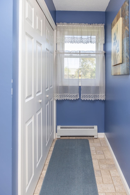 188 State Road Whately, MA 01373 - Photo 9 of 42 a view of hallway with granite countertop and a window