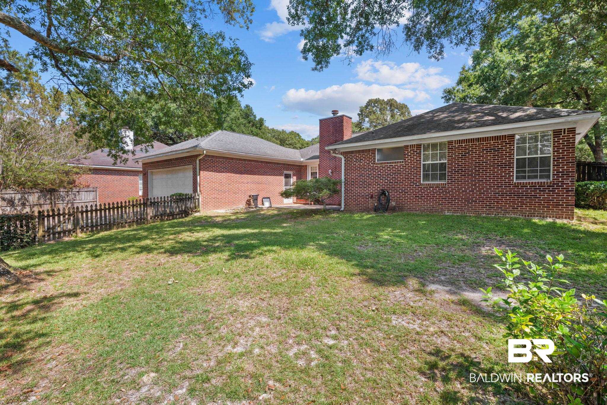 1340 Wellsley Court Mobile, AL 36695 - Photo 9 of 37 View of yard with an attached garage