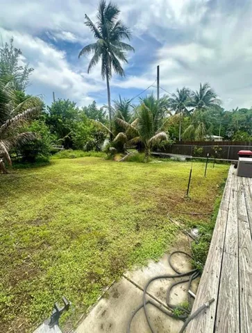 a view of a swimming pool with a garden