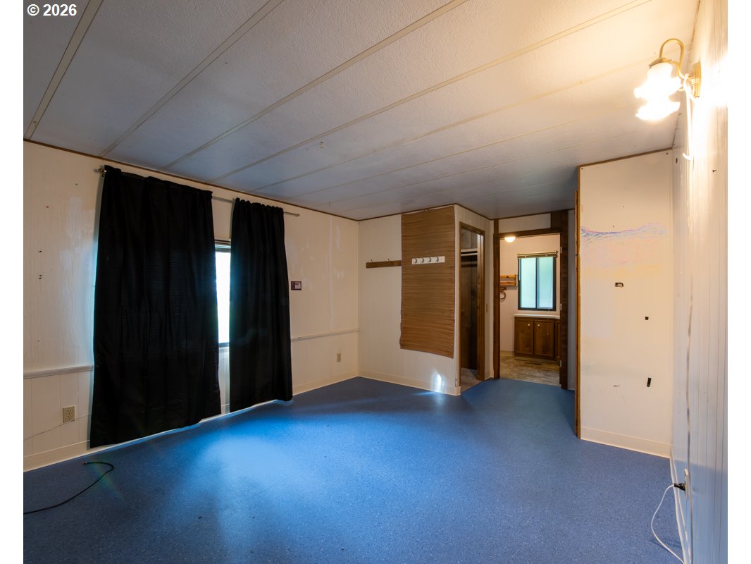 5335 Main Street Springfield, OR 97478 - Photo 16 of 43 a view of empty room with wooden floor