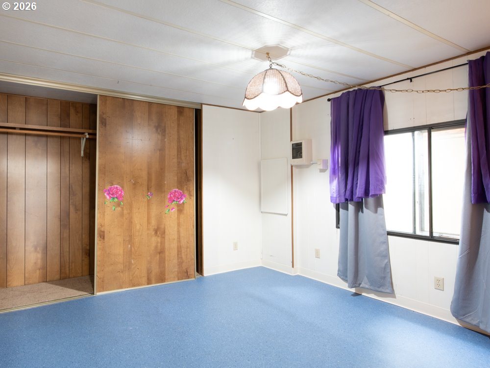 5335 Main Street Springfield, OR 97478 - Photo 26 of 43 a view of empty room with a ceiling fan