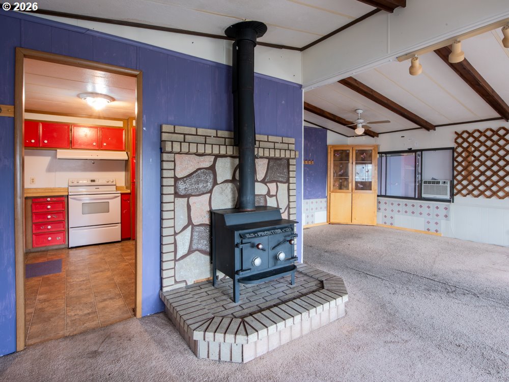 5335 Main Street Springfield, OR 97478 - Photo 34 of 43 a living room with furniture and a fireplace