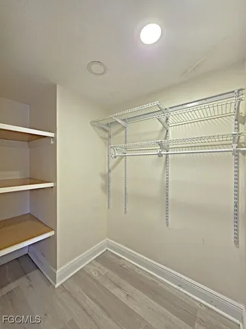 a view of an empty walk in closet
