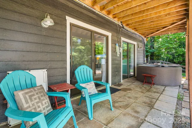a backyard of a house with seating space