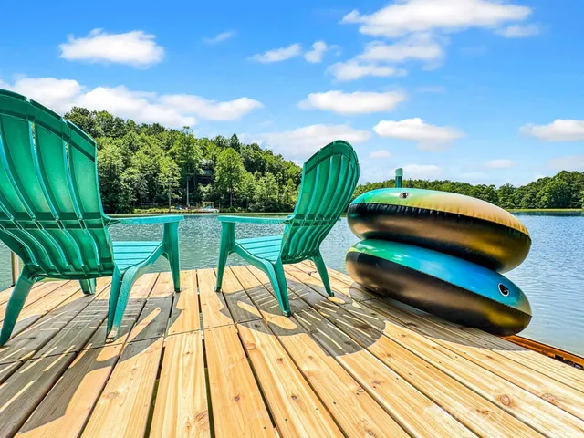 a view of swimming pool with a seating space