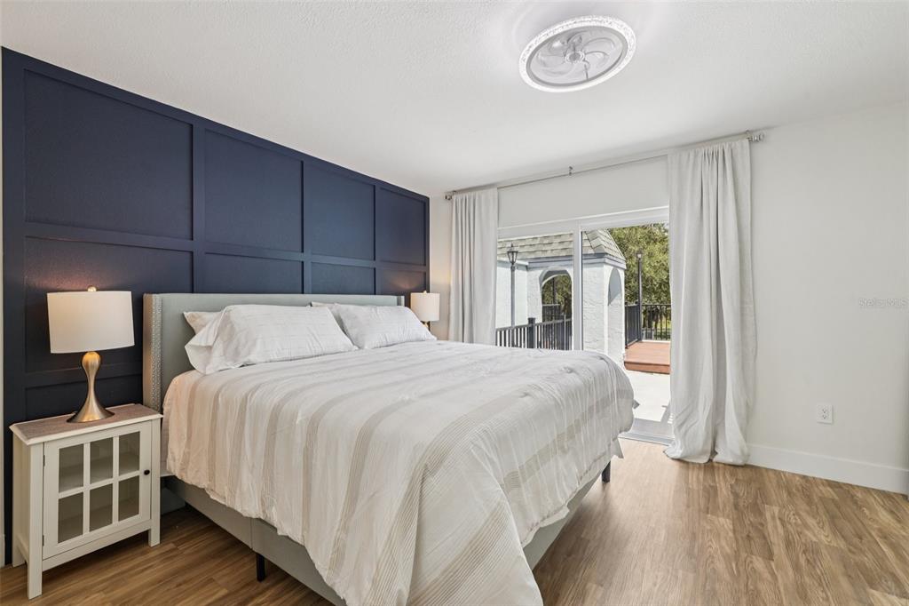 4471 Vieux Carre Circle, Unit 4471 Tampa, FL 33613 - Photo 25 of 58 a bedroom with a bed and a window