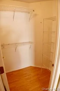 a view of a room with racks on the wall