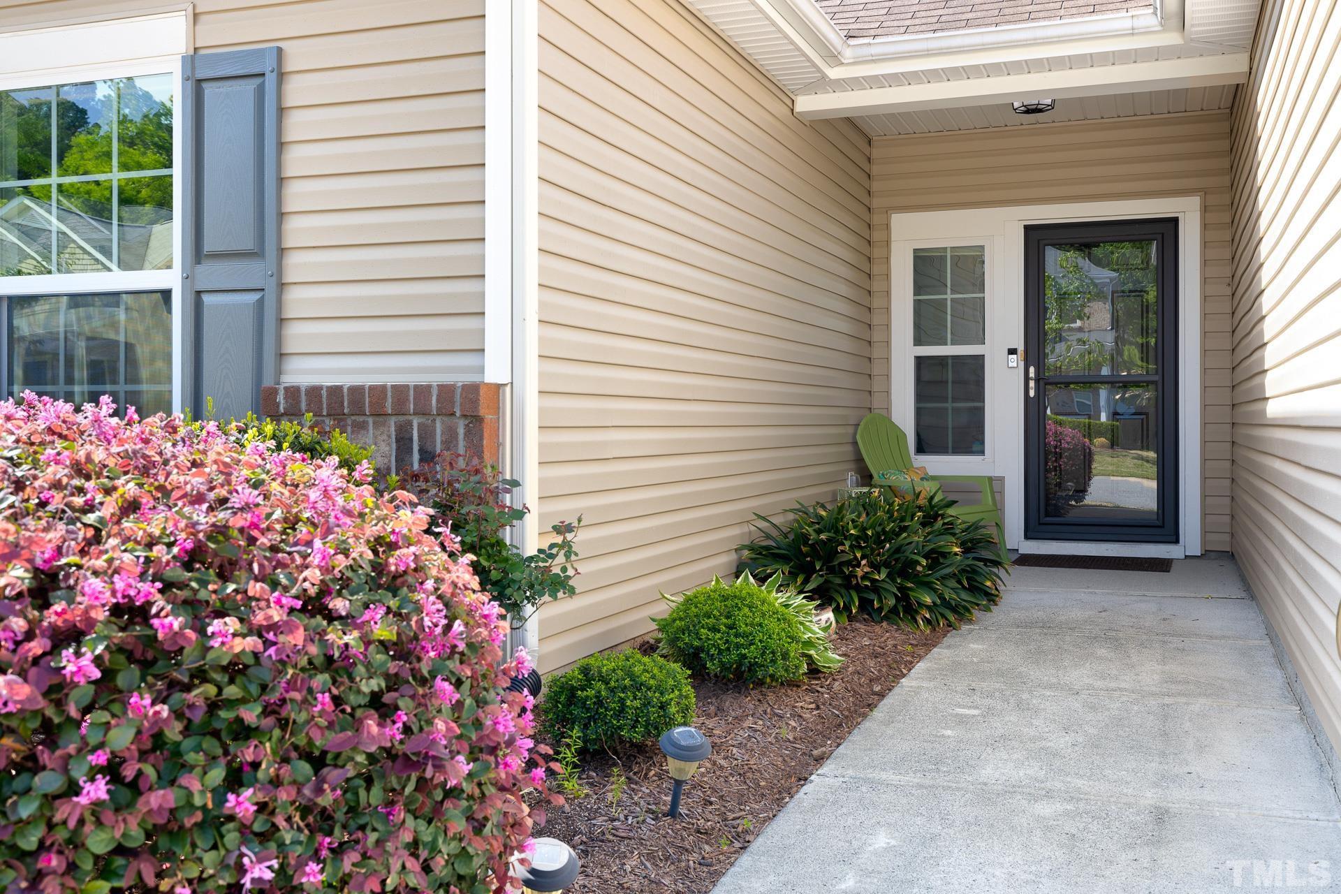 128 Rosaline Lane Durham, NC 27713 - Photo 2 of 31 a potted plant sitting in front of a house