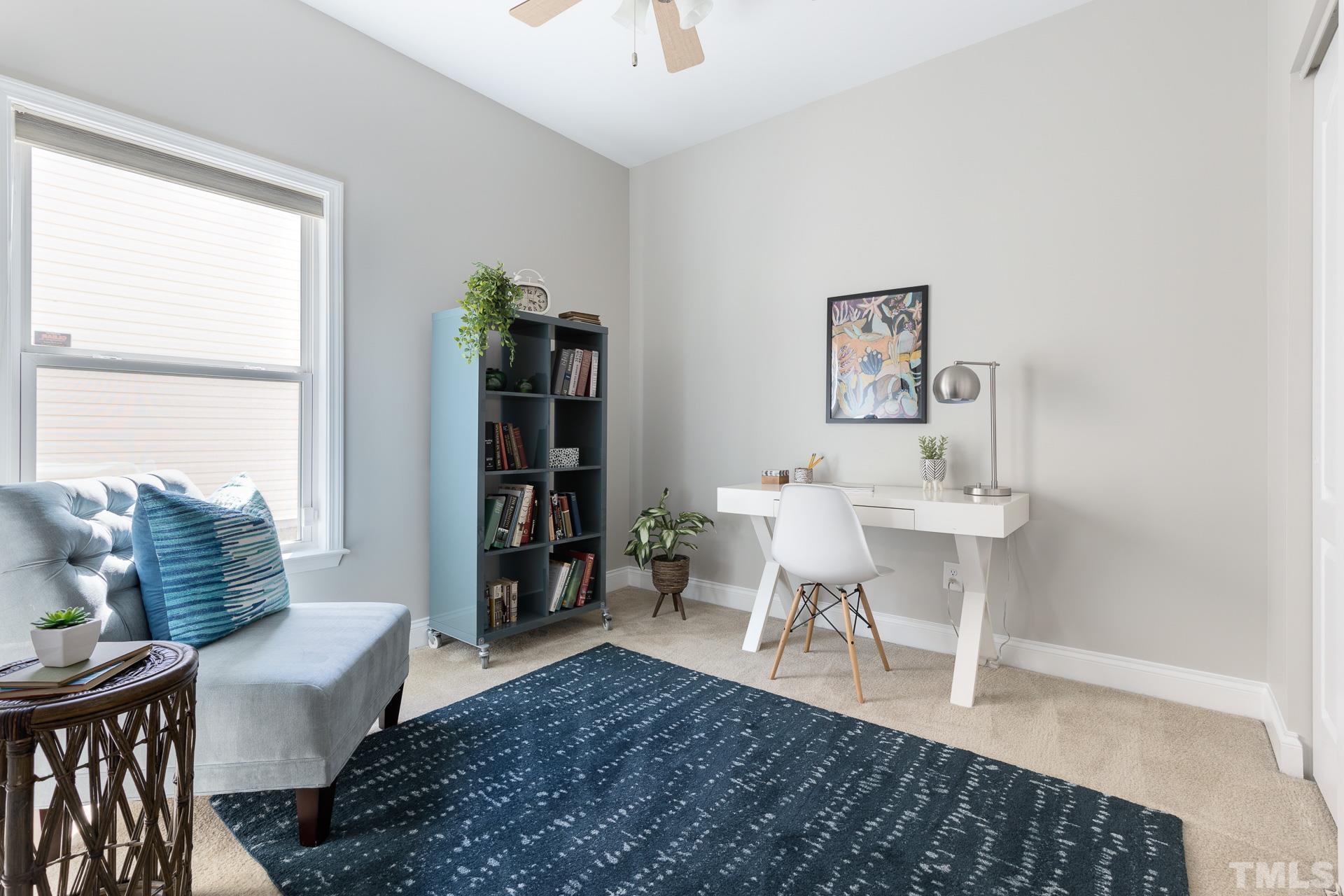 128 Rosaline Lane Durham, NC 27713 - Photo 25 of 31 a living room with furniture and a table
