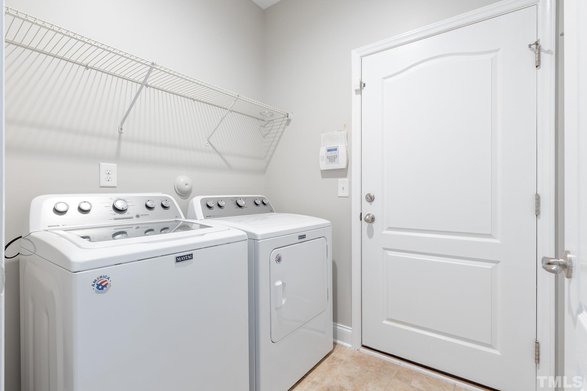 128 Rosaline Lane Durham, NC 27713 - Photo 28 of 31 a utility room with dryer and washer