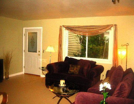 85 Chestnut Street, Unit G Bethel, CT 06801 - Photo 1 of 1 a living room with furniture and a large window
