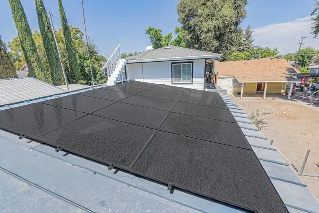 a backyard of a house with seating space