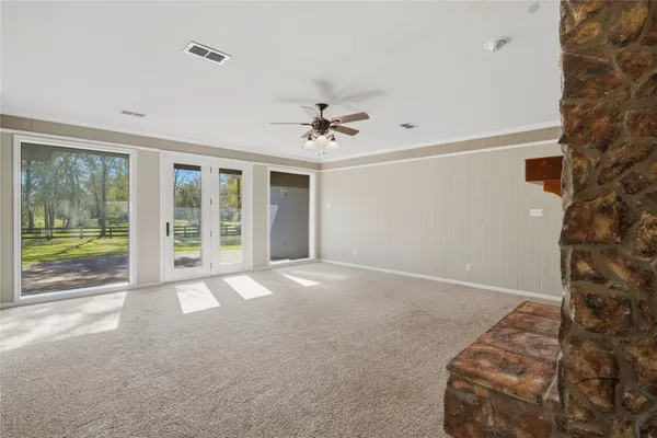 a view of livingroom with furniture wooden floor and window