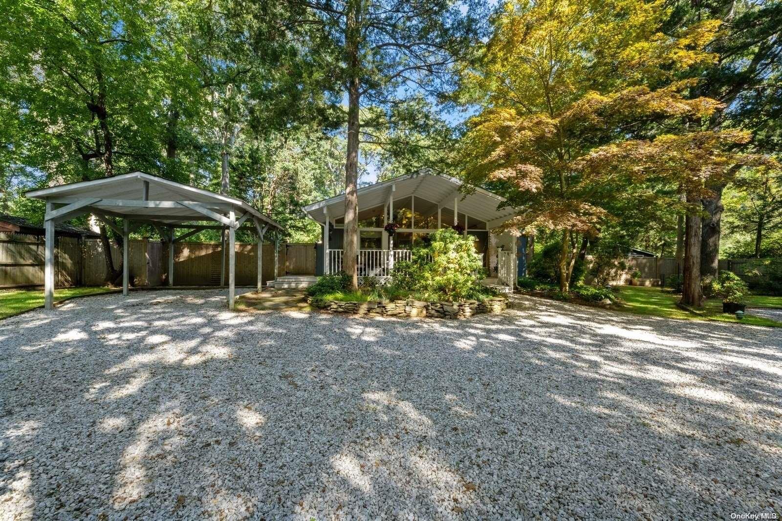 63 Rutland Road East Hampton, NY 11937 - Photo 1 of 1 a view of a large trees with a trees