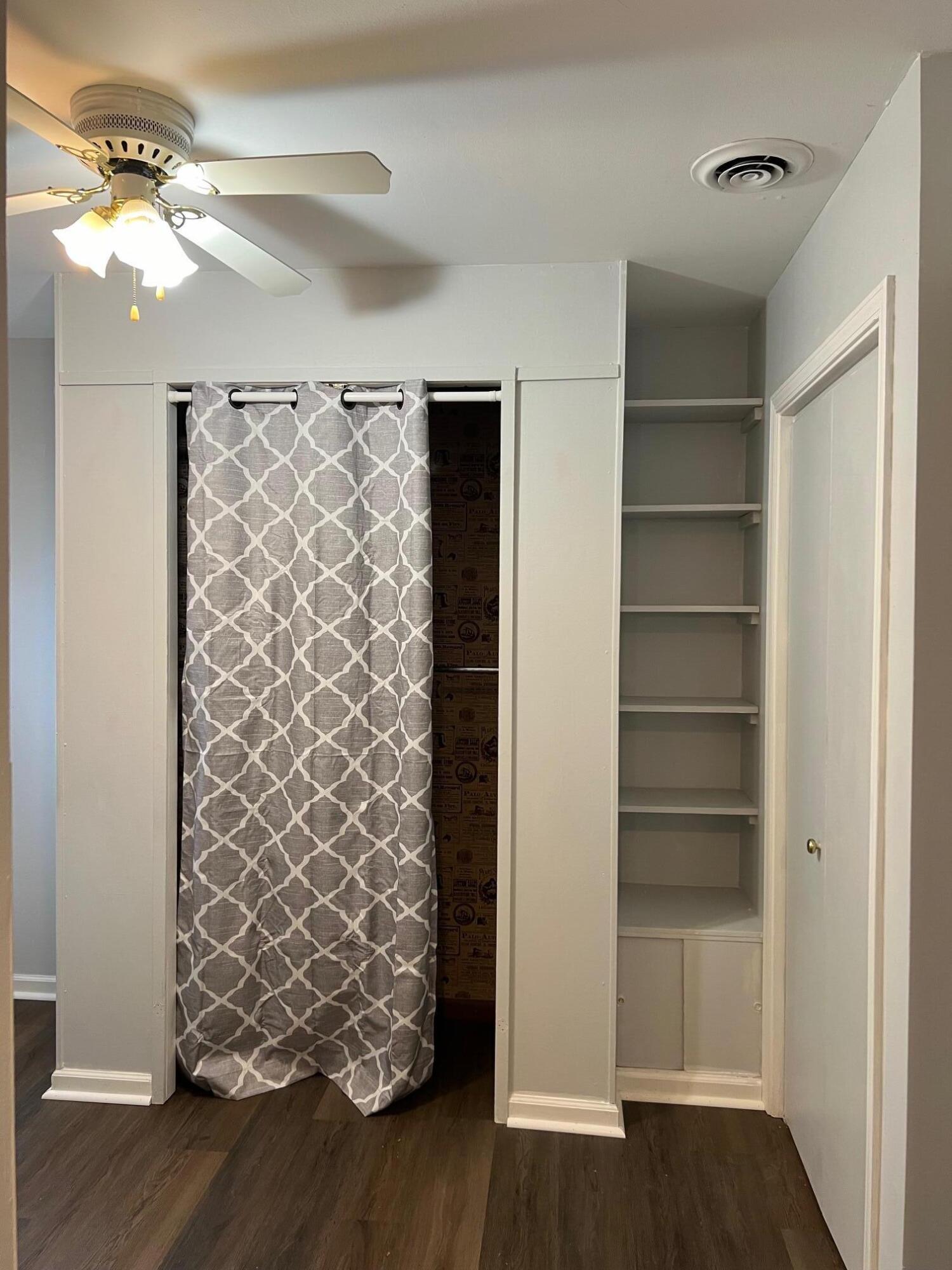 655 Gene Lane Valparaiso, IN 46385 - Photo 13 of 21 a room with a walk in closet and wooden floor